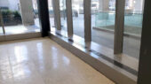 Custom convector enclosures to match a curtain wall system in Brooklyn, NY